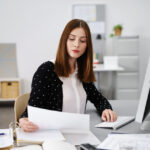 businesswoman checking documents